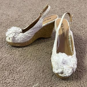 White heels size 7 women by CL Laundry.